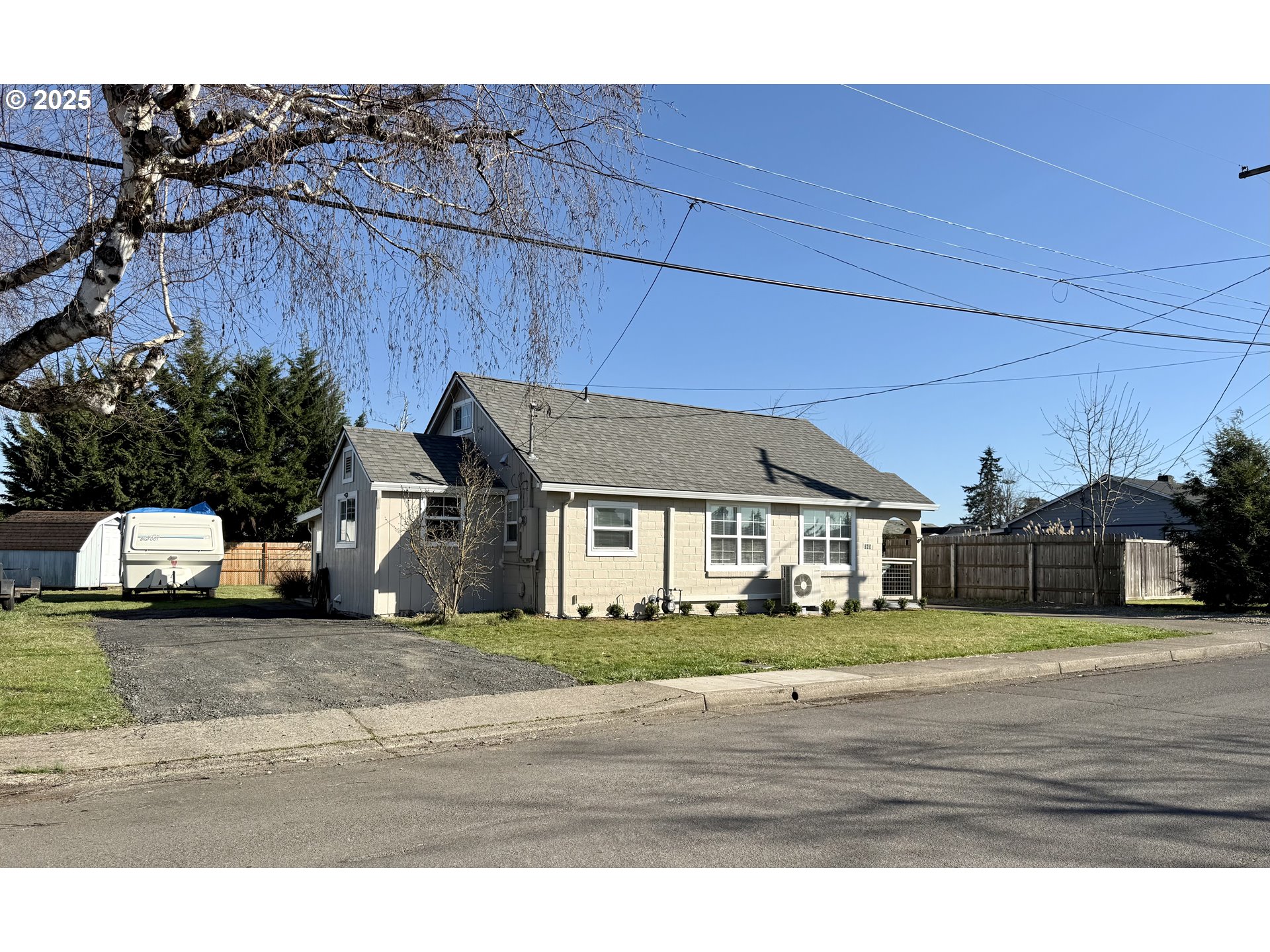 345 38th Street Springfield, OR 97478 - Photo 3 of 29 a view of a street with houses