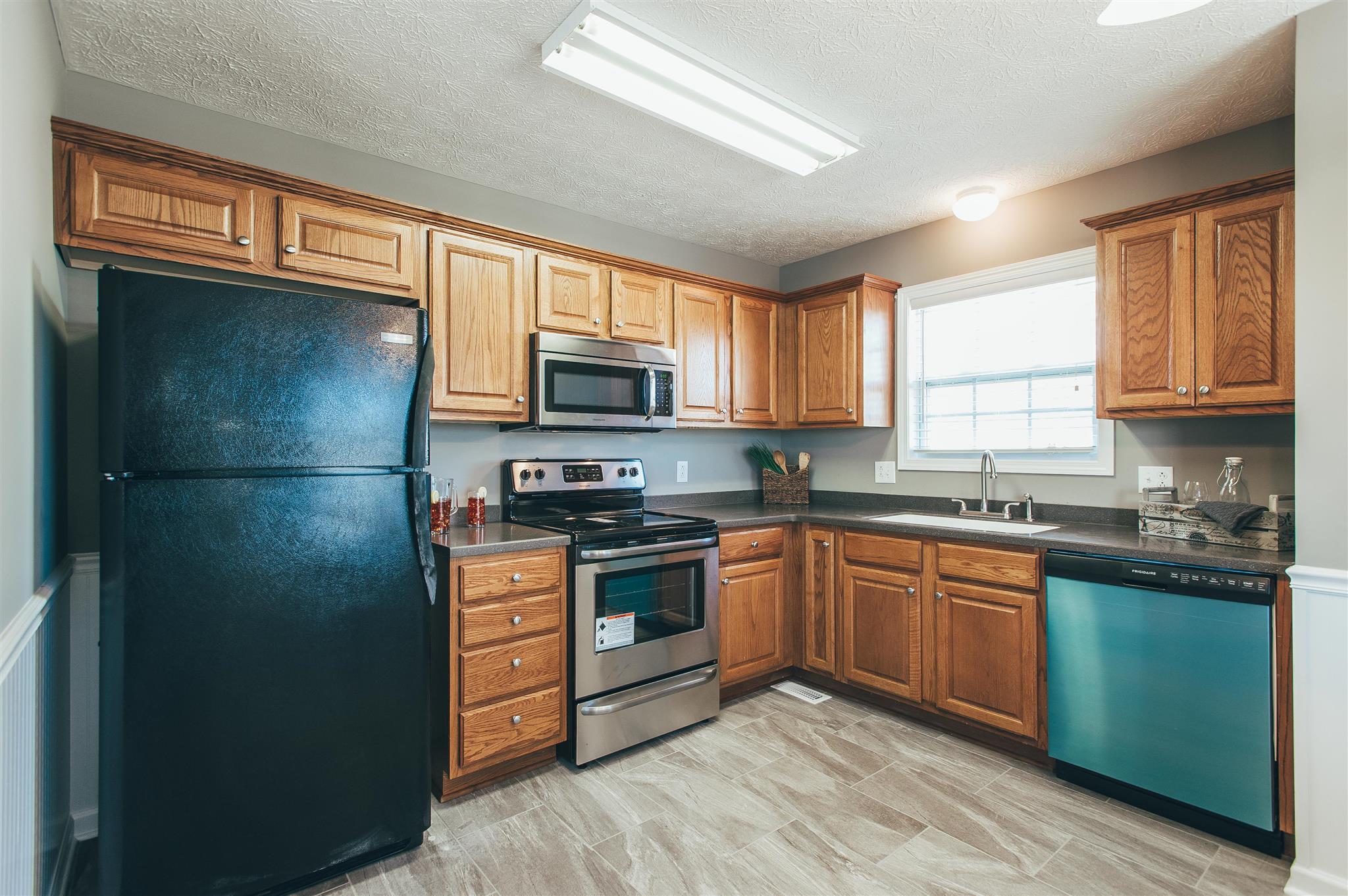 407 Arabian Lane Springfield, TN 37172 - Photo 11 of 26 Kitchen is freshly painted & has new appliances