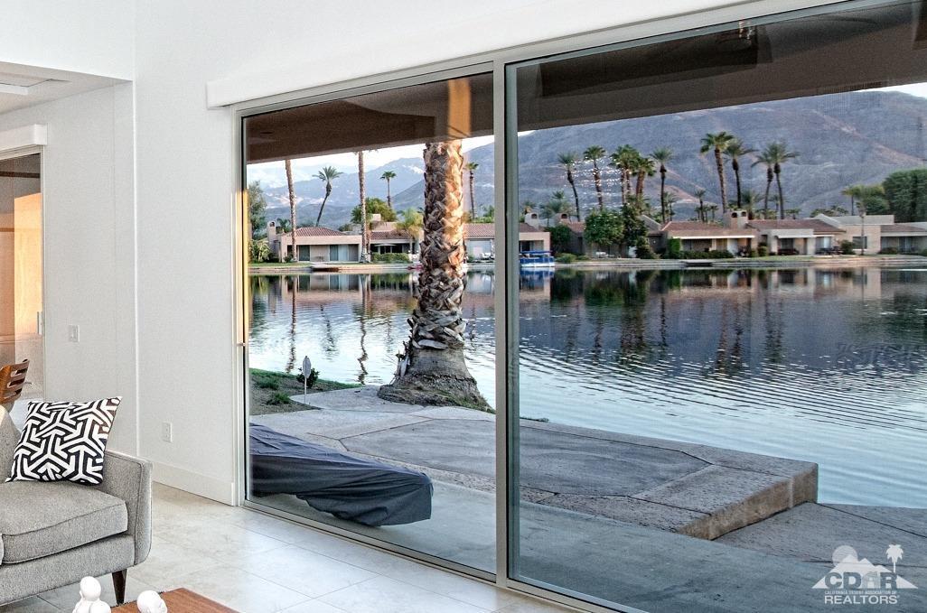 125 Lakeshore Drive Rancho Mirage, CA 92270 - Photo 11 of 79 a view of swimming pool from a living room