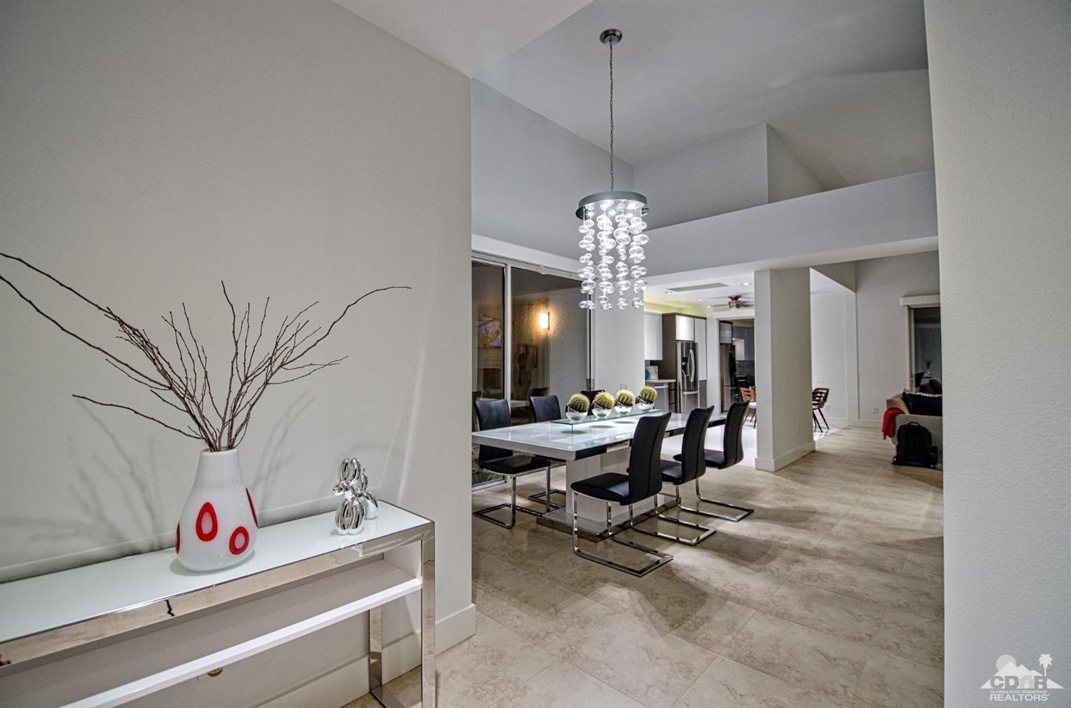 125 Lakeshore Drive Rancho Mirage, CA 92270 - Photo 16 of 79 a view of a room with gym equipment