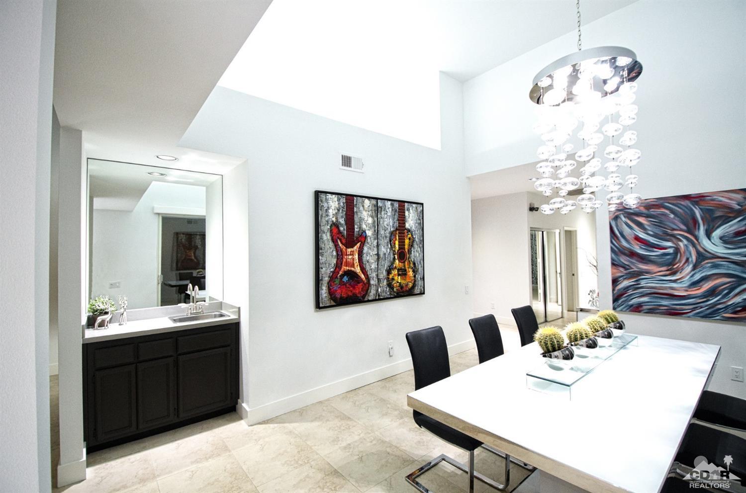 125 Lakeshore Drive Rancho Mirage, CA 92270 - Photo 22 of 79 a view of a dining room with furniture