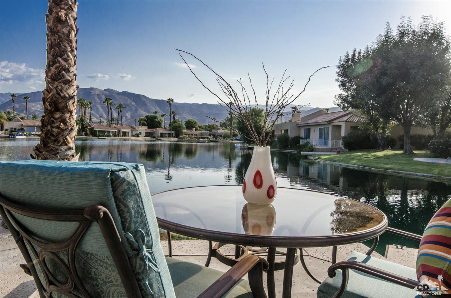 125 Lakeshore Drive Rancho Mirage, CA 92270 - Photo 33 of 79 a view of a lake from a balcony