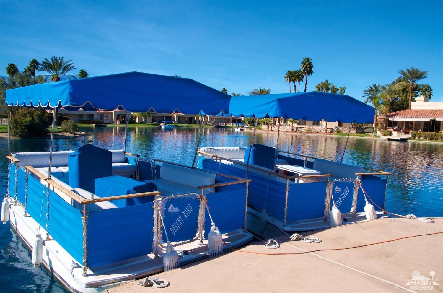 125 Lakeshore Drive Rancho Mirage, CA 92270 - Photo 68 of 79 a view of a balcony with chairs and wooden floor