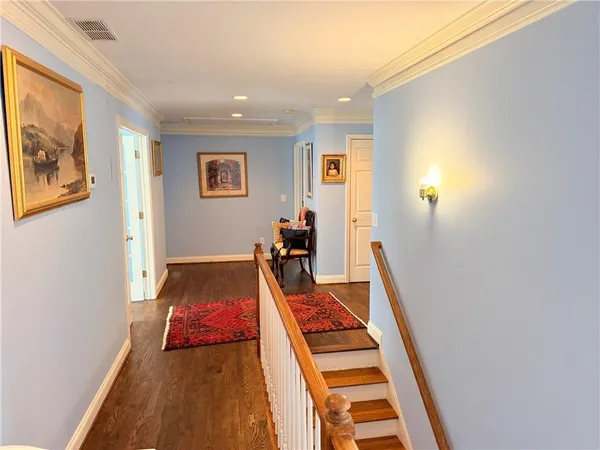 a room with furniture and air hockey table