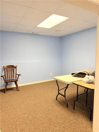 a room with a table and chairs