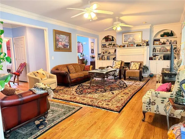a living room with furniture and a rug