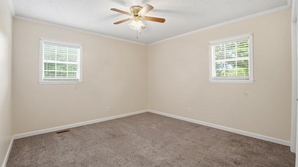 91 Golden Road Lynchburg, TN 37352 - Photo 13 of 24 an empty room with a window and a fan