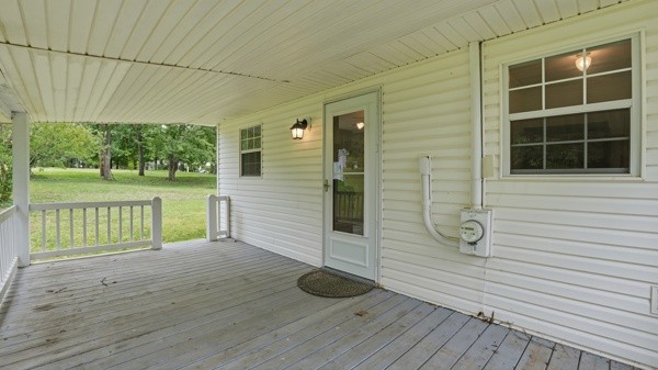 91 Golden Road Lynchburg, TN 37352 - Photo 18 of 24 a view of a deck with wooden floor and fence