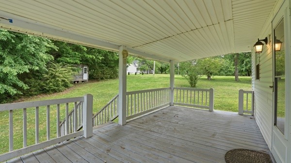 91 Golden Road Lynchburg, TN 37352 - Photo 19 of 24 a view of a deck with yard and wooden floor