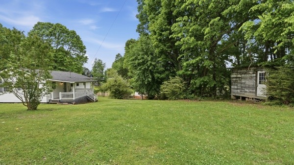 91 Golden Road Lynchburg, TN 37352 - Photo 20 of 24 a view of a house with a big yard