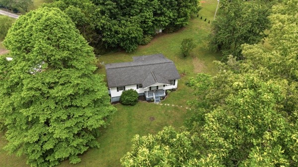 91 Golden Road Lynchburg, TN 37352 - Photo 21 of 24 an aerial view of a house with a yard