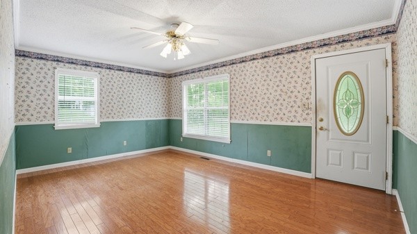 91 Golden Road Lynchburg, TN 37352 - Photo 5 of 24 a view of a room with window wooden floor and fan