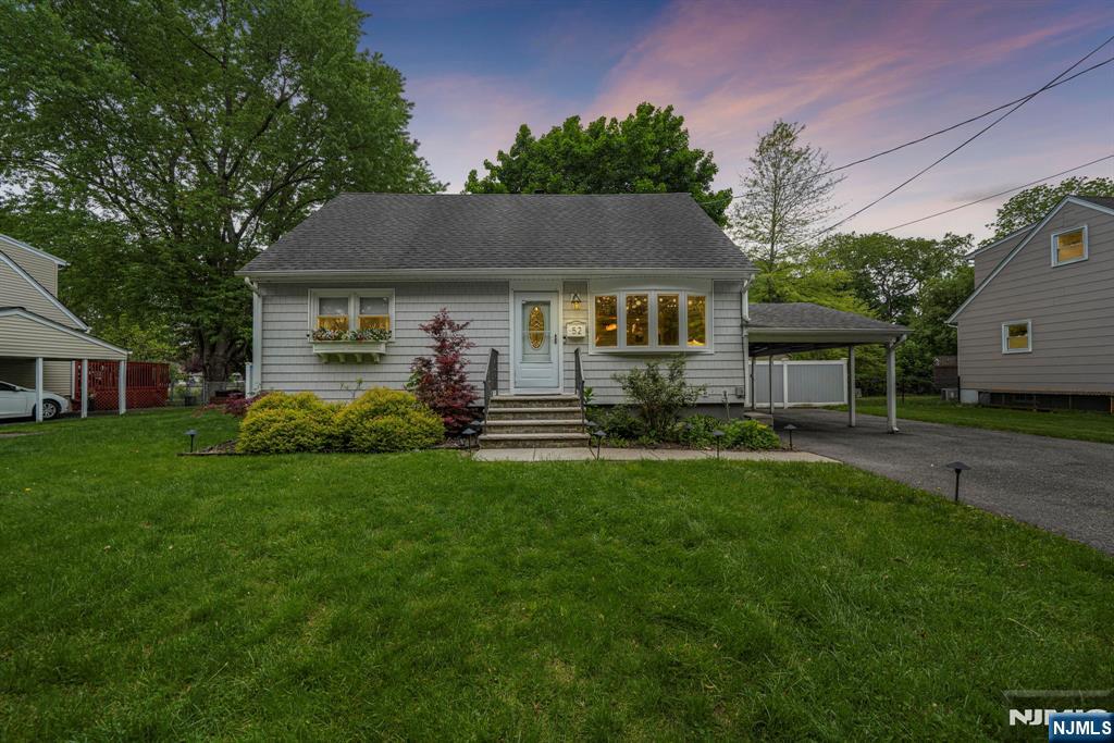 52 Barbara Drive Pompton Lakes, NJ 07442 - Photo 1 of 30 a front view of a house with a garden