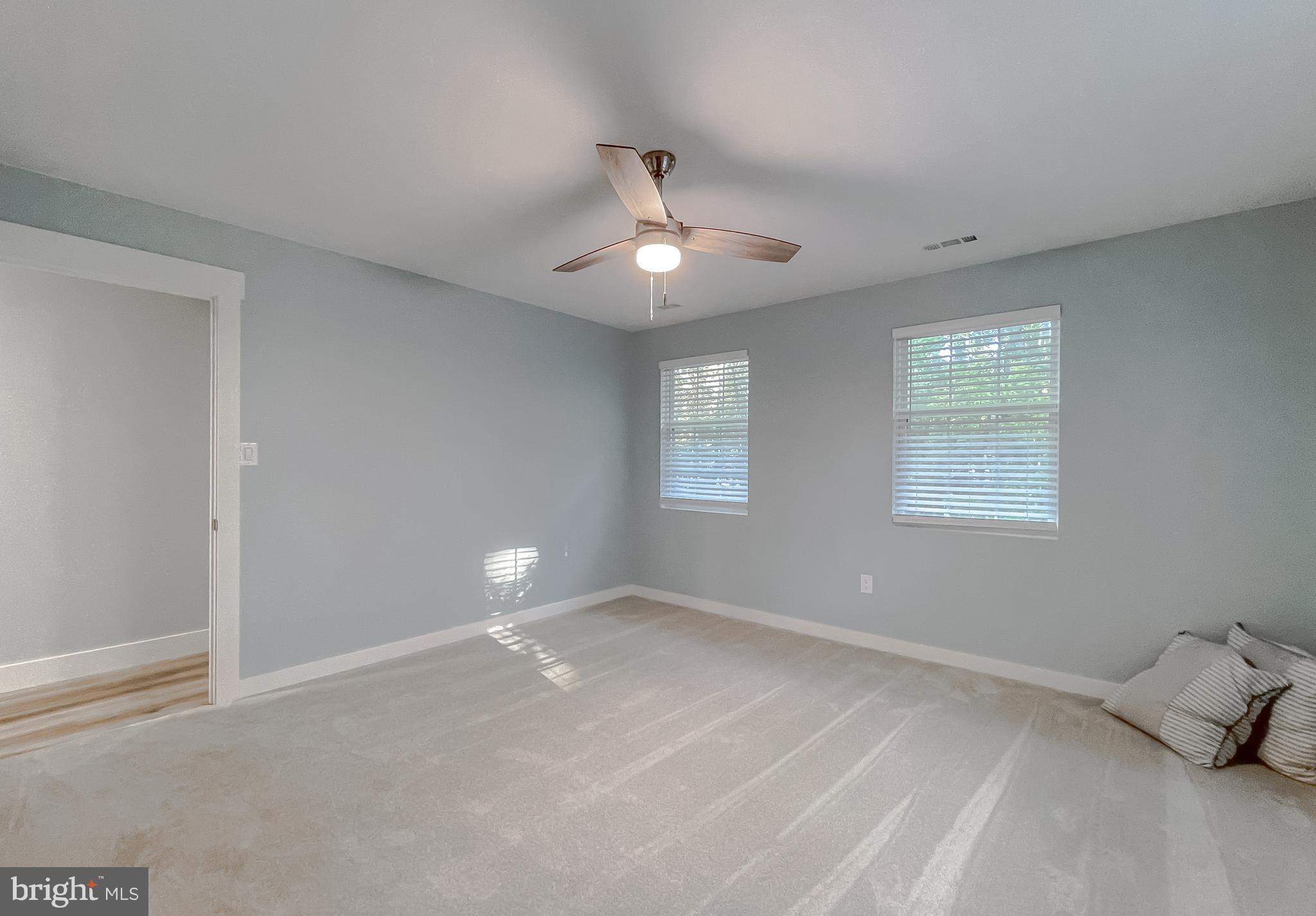 13630 Dowell Road Solomons, MD 20657 - Photo 69 of 121 a view of empty room with ceiling fan