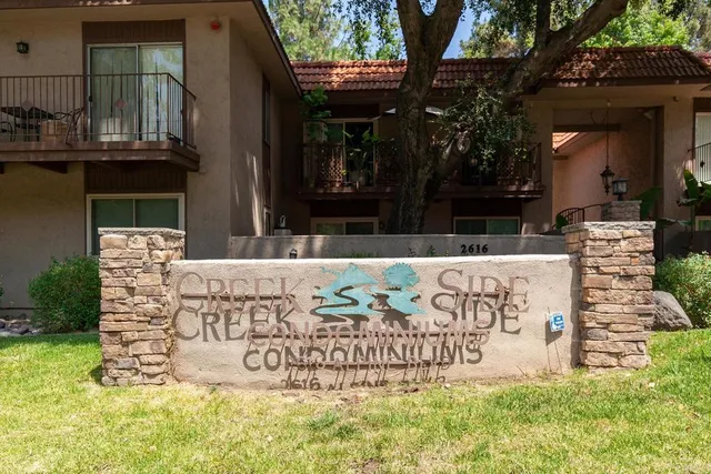 a outdoor space with signage and a mirror