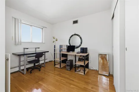 a view of a workspace with furniture