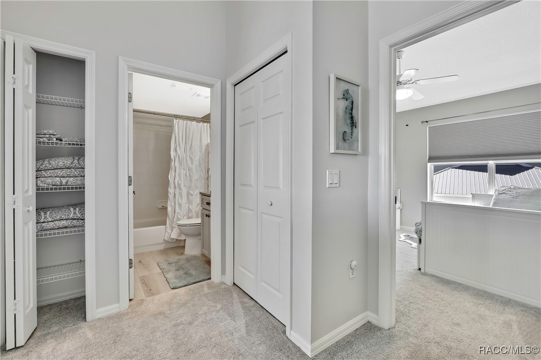 2855 North Rivers Edge Boulevard, Unit 213 Crystal River, FL 34429 - Photo 30 of 62 a bathroom with a shower and a glass door