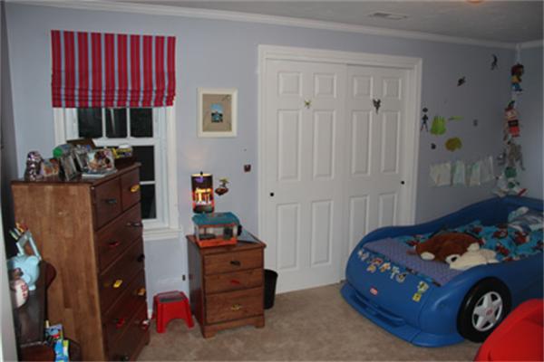 2 B Catherine Road Framingham, MA 01701 - Photo 14 of 30 a bedroom with a bed and a closet