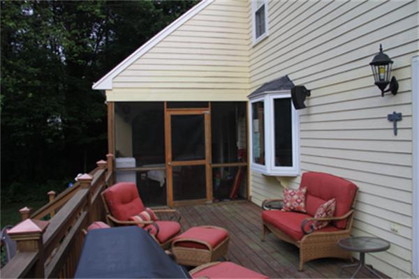 2 B Catherine Road Framingham, MA 01701 - Photo 20 of 30 a backyard of a house with outdoor seating
