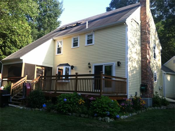 2 B Catherine Road Framingham, MA 01701 - Photo 2 of 30 a front view of house with yard and green space