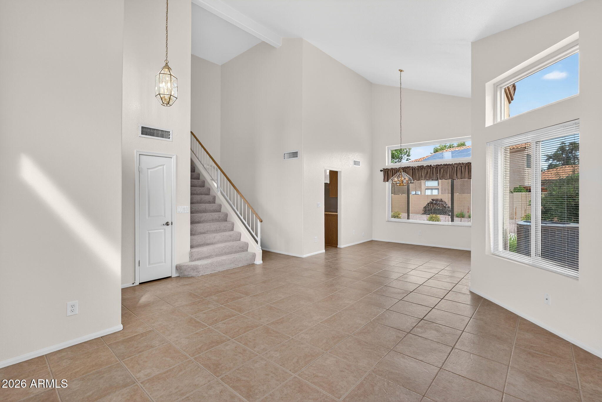 310 East Vaughn Avenue Gilbert, AZ 85234 - Photo 13 of 73 a view of a hallway with staircase