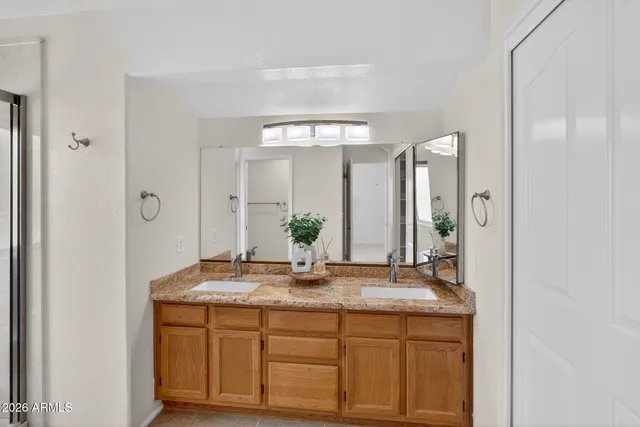 a view of a house with a cars park