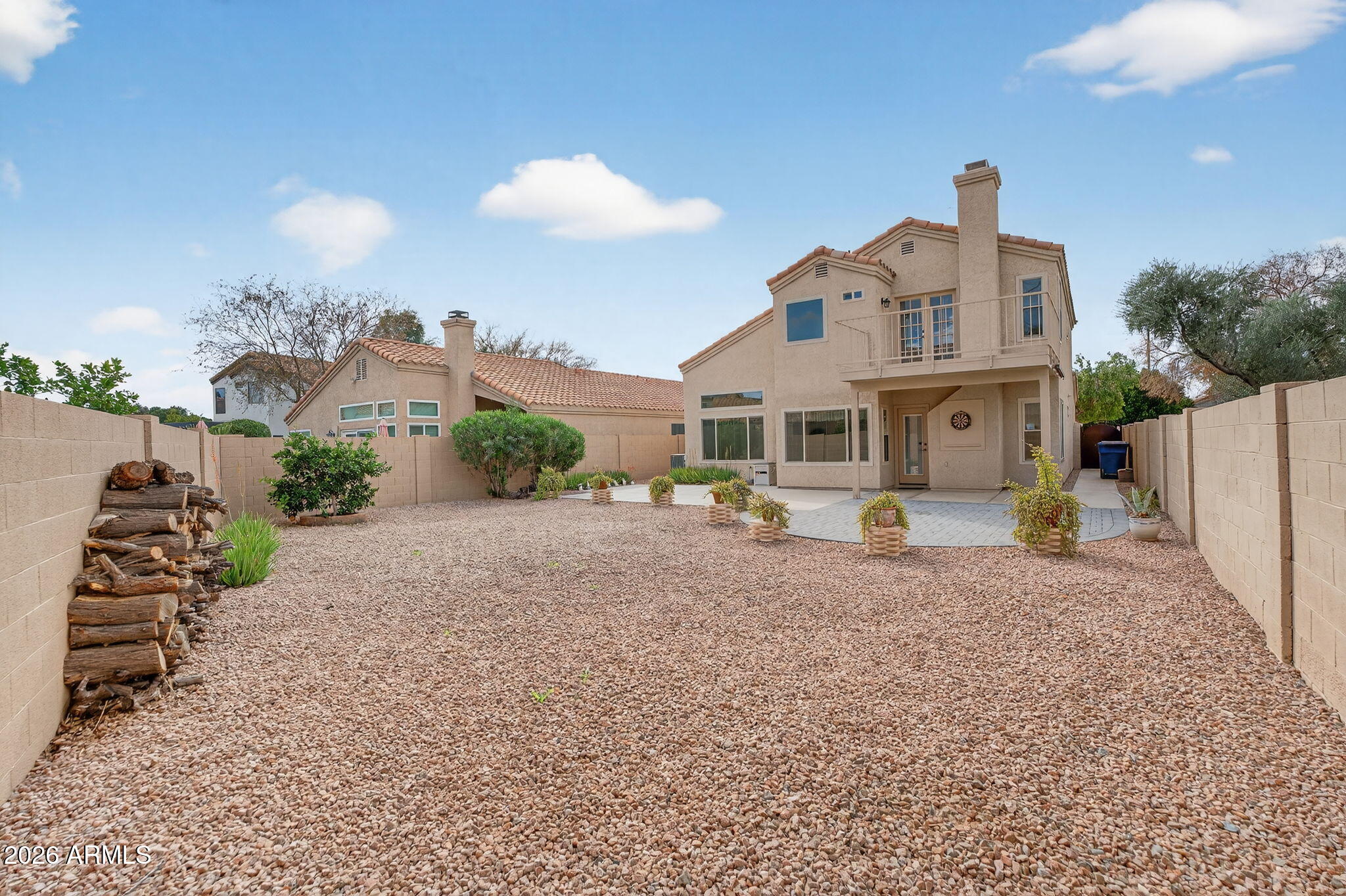 310 East Vaughn Avenue Gilbert, AZ 85234 - Photo 60 of 73 a front view of a house with a yard
