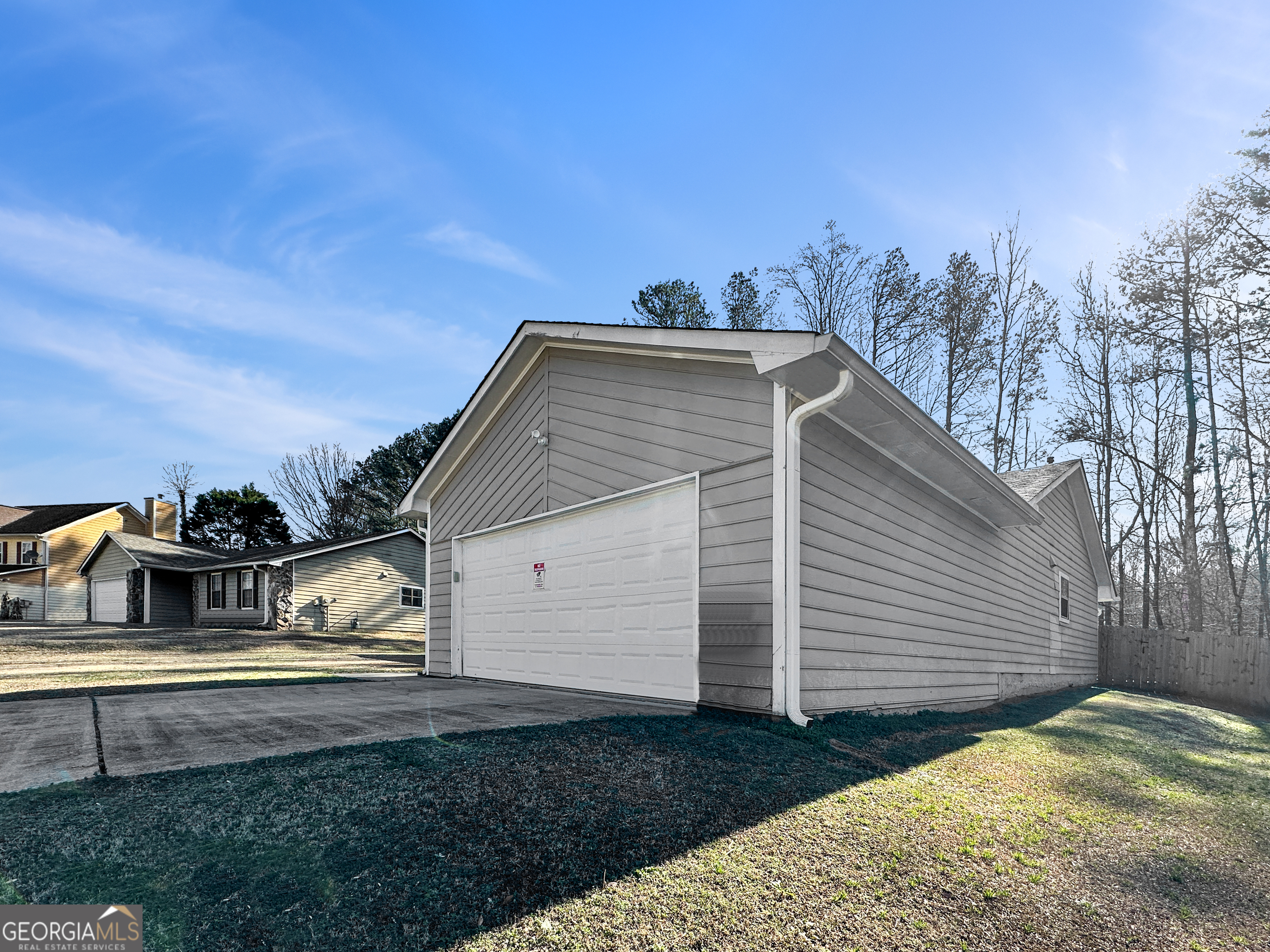 1299 Bugle Court Hampton, GA 30228 - Photo 3 of 18 a view of a house with a yard