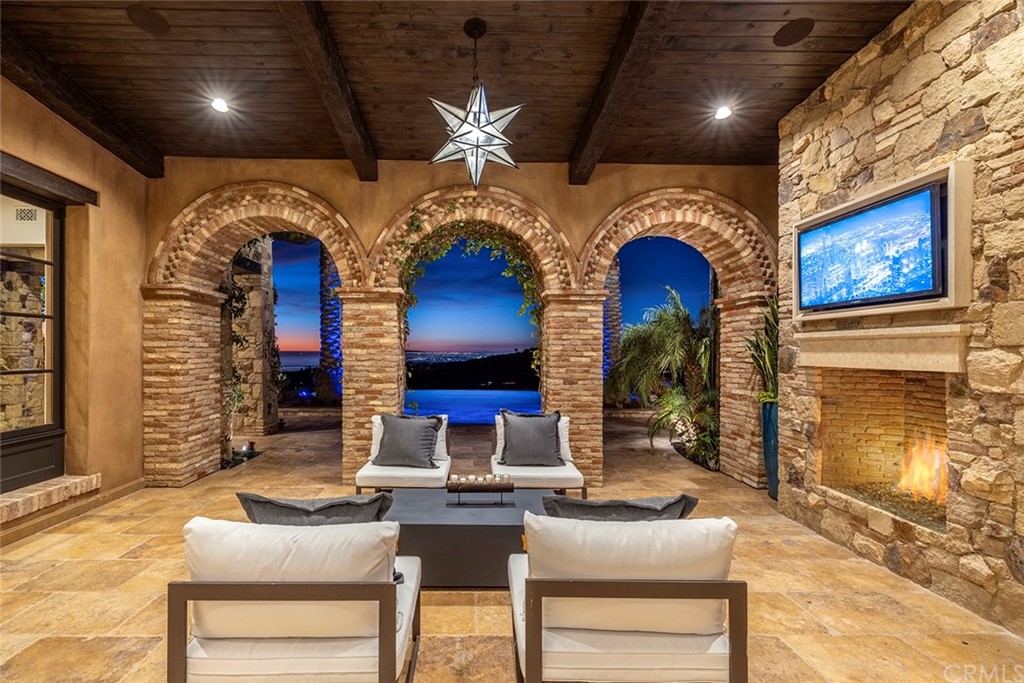 5 Clear Water Newport Coast, CA 92657 - Photo 14 of 41 a living room with furniture and a fireplace