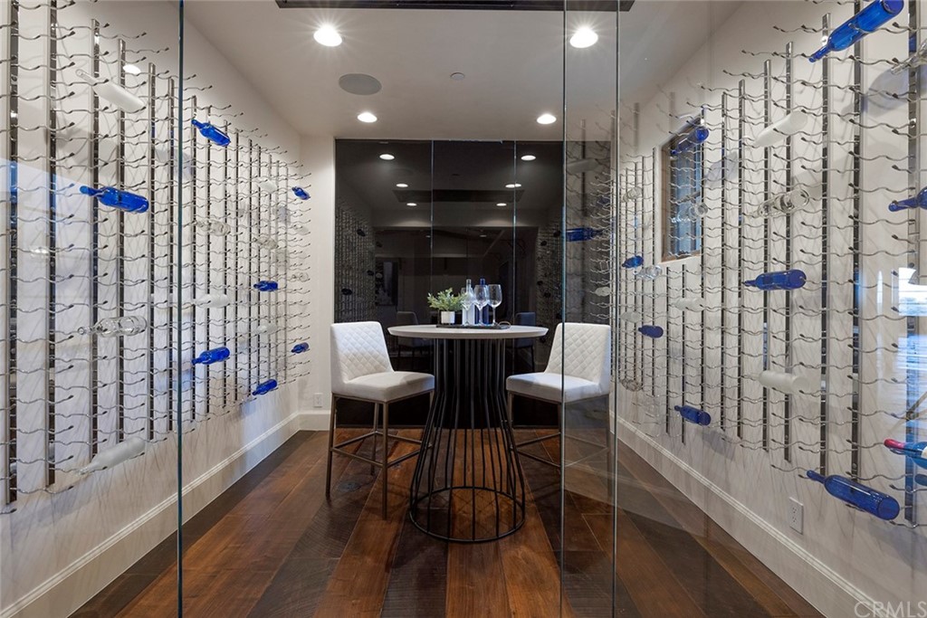 5 Clear Water Newport Coast, CA 92657 - Photo 16 of 41 a dining room with furniture and wooden floor