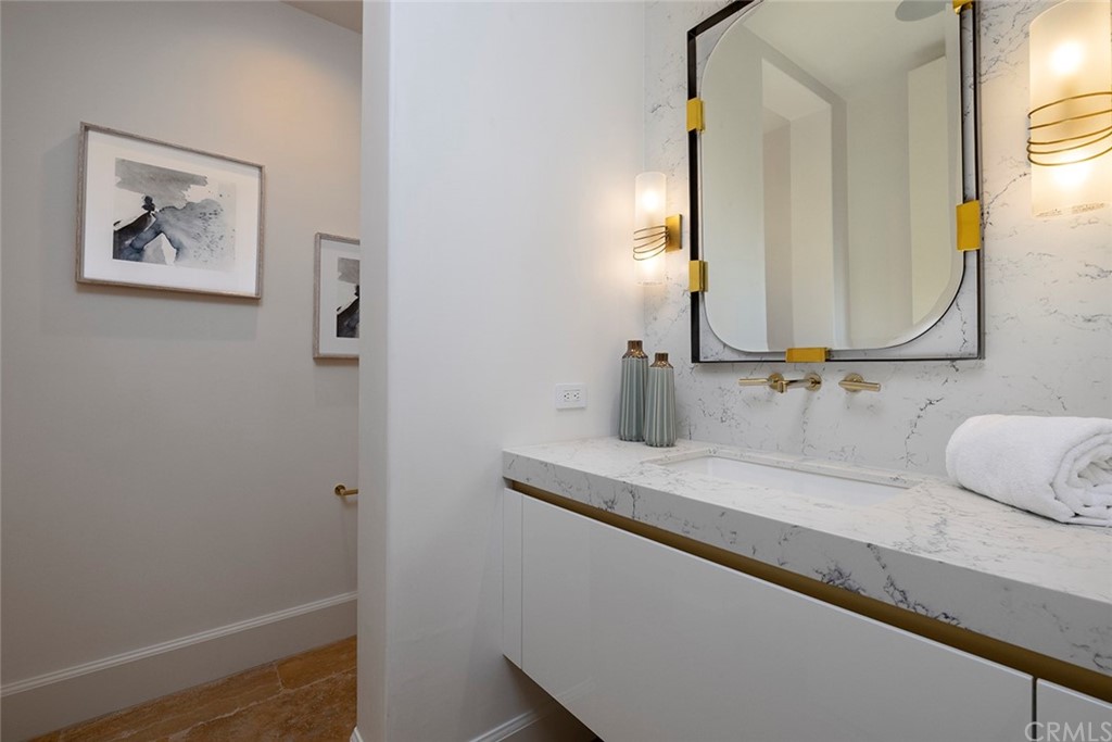 5 Clear Water Newport Coast, CA 92657 - Photo 18 of 41 a bathroom with a sink and a mirror