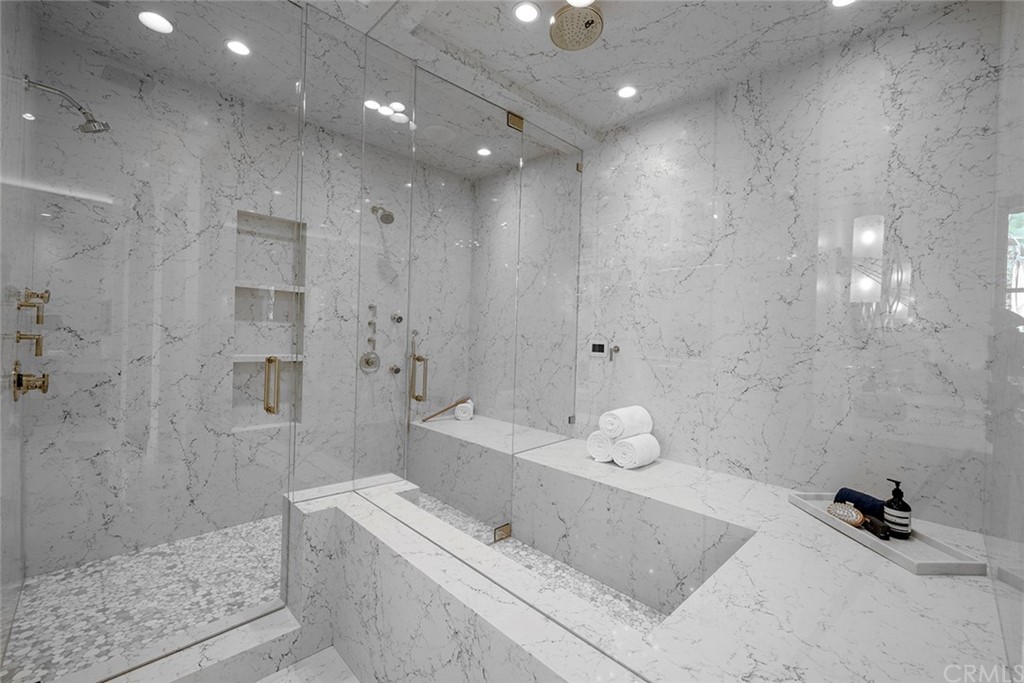 5 Clear Water Newport Coast, CA 92657 - Photo 23 of 41 a bathroom with a tub sink and shower