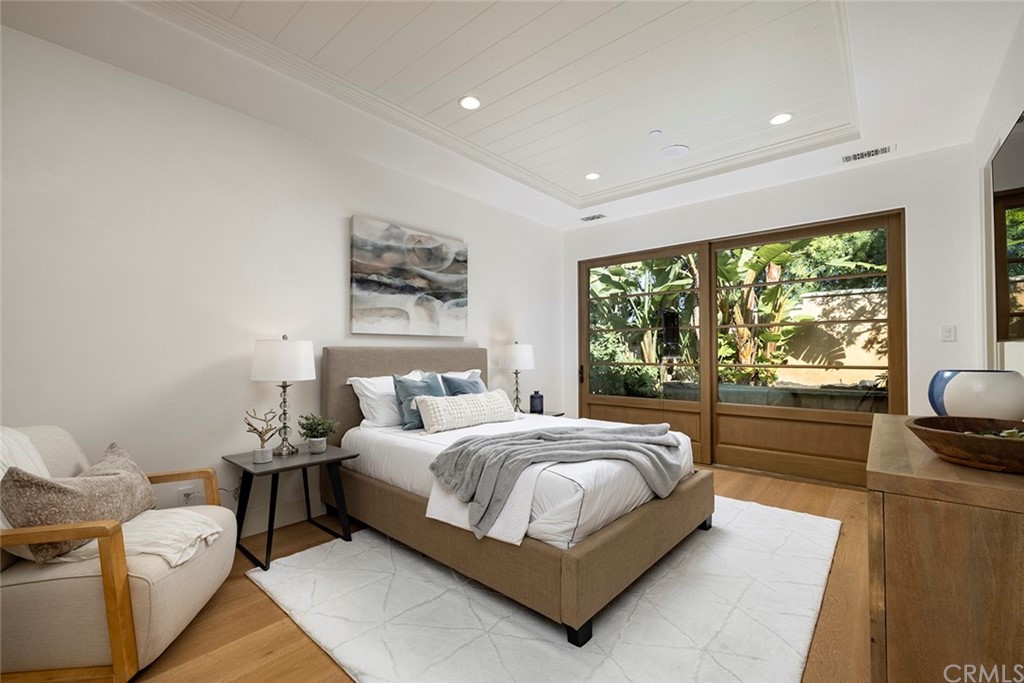 5 Clear Water Newport Coast, CA 92657 - Photo 26 of 41 a bedroom with a bed and a large window