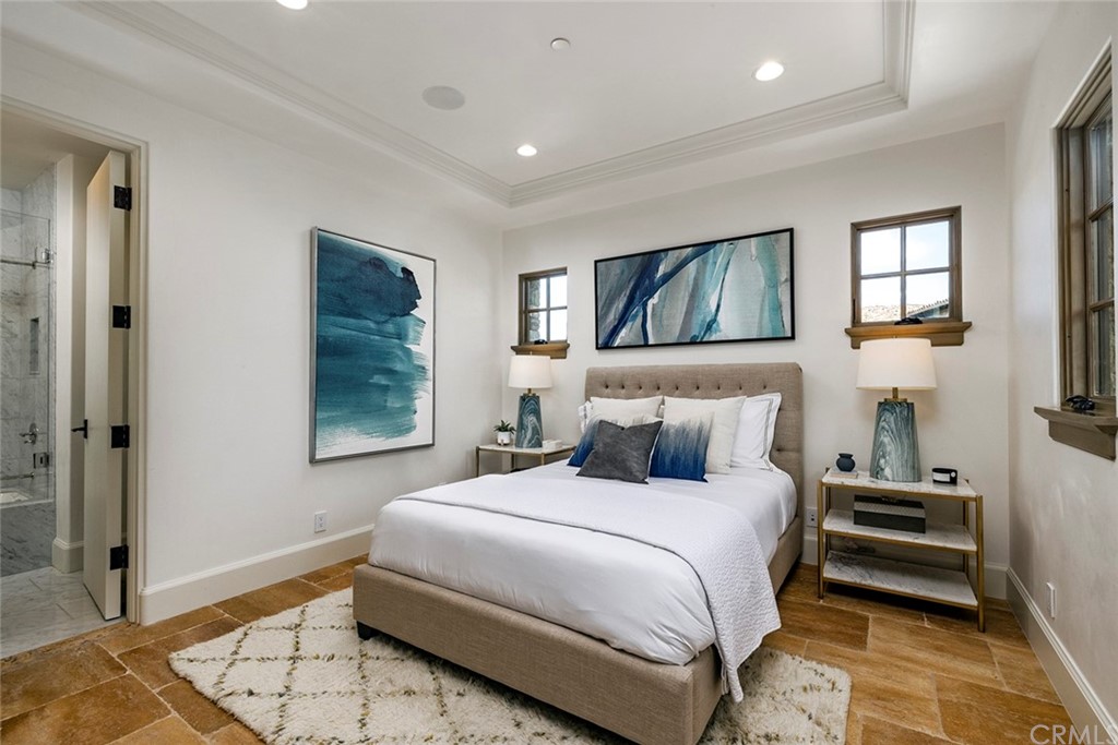 5 Clear Water Newport Coast, CA 92657 - Photo 33 of 41 a bedroom with a bed and a window