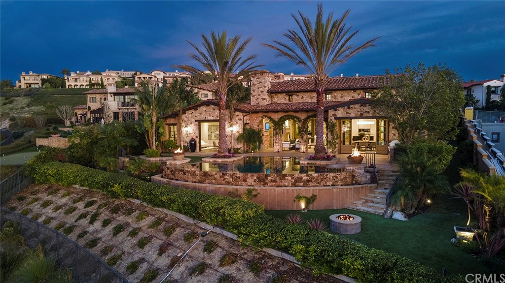 5 Clear Water Newport Coast, CA 92657 - Photo 38 of 41 a view of a house with backyard porch and sitting area