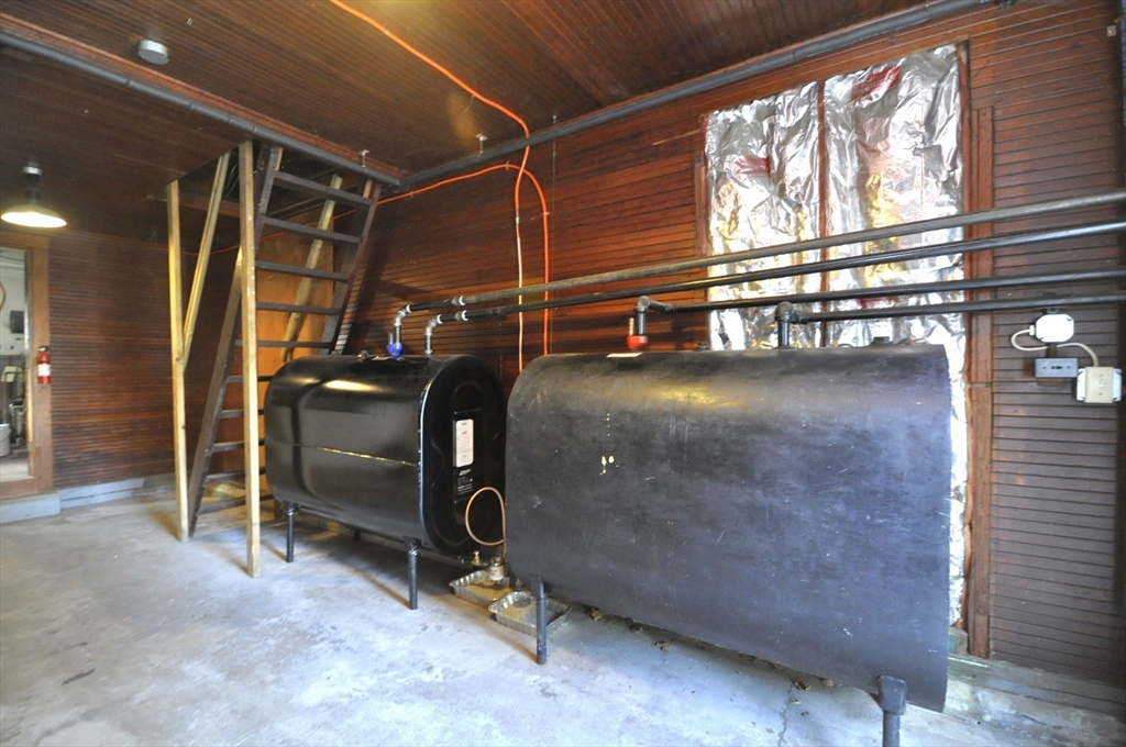 164 Warren Avenue Whitman, MA 02382 - Photo 25 of 34 a view of a room with gym equipment