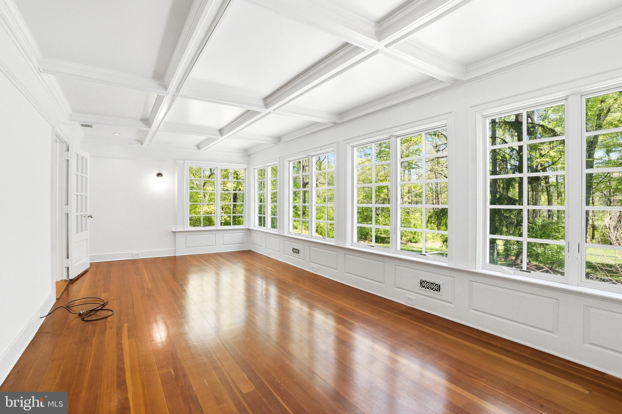 4511 Province Line Road Princeton, NJ 08540 - Photo 11 of 34 a view of an empty room with wooden floor and a window