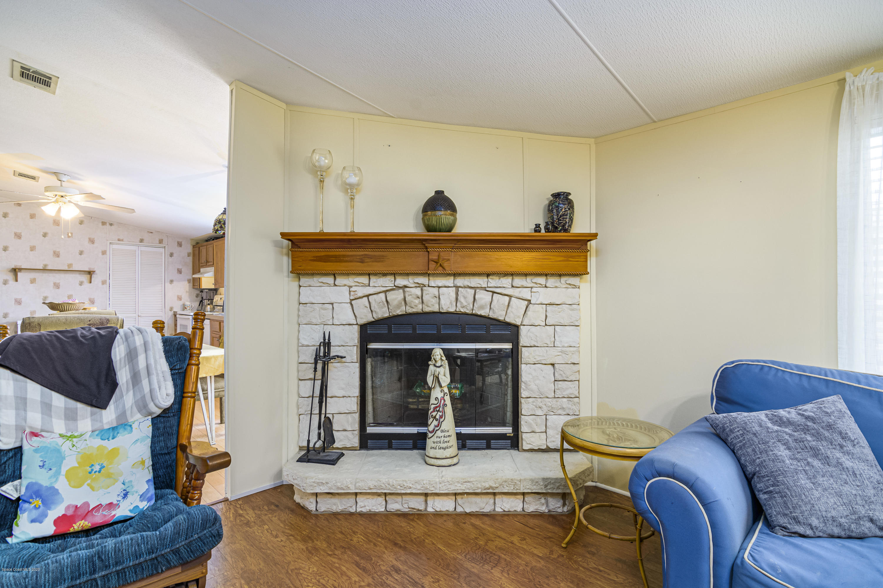 1818 Mango Street Northeast Palm Bay, FL 32905 - Photo 14 of 18 Family Room With Fireplace