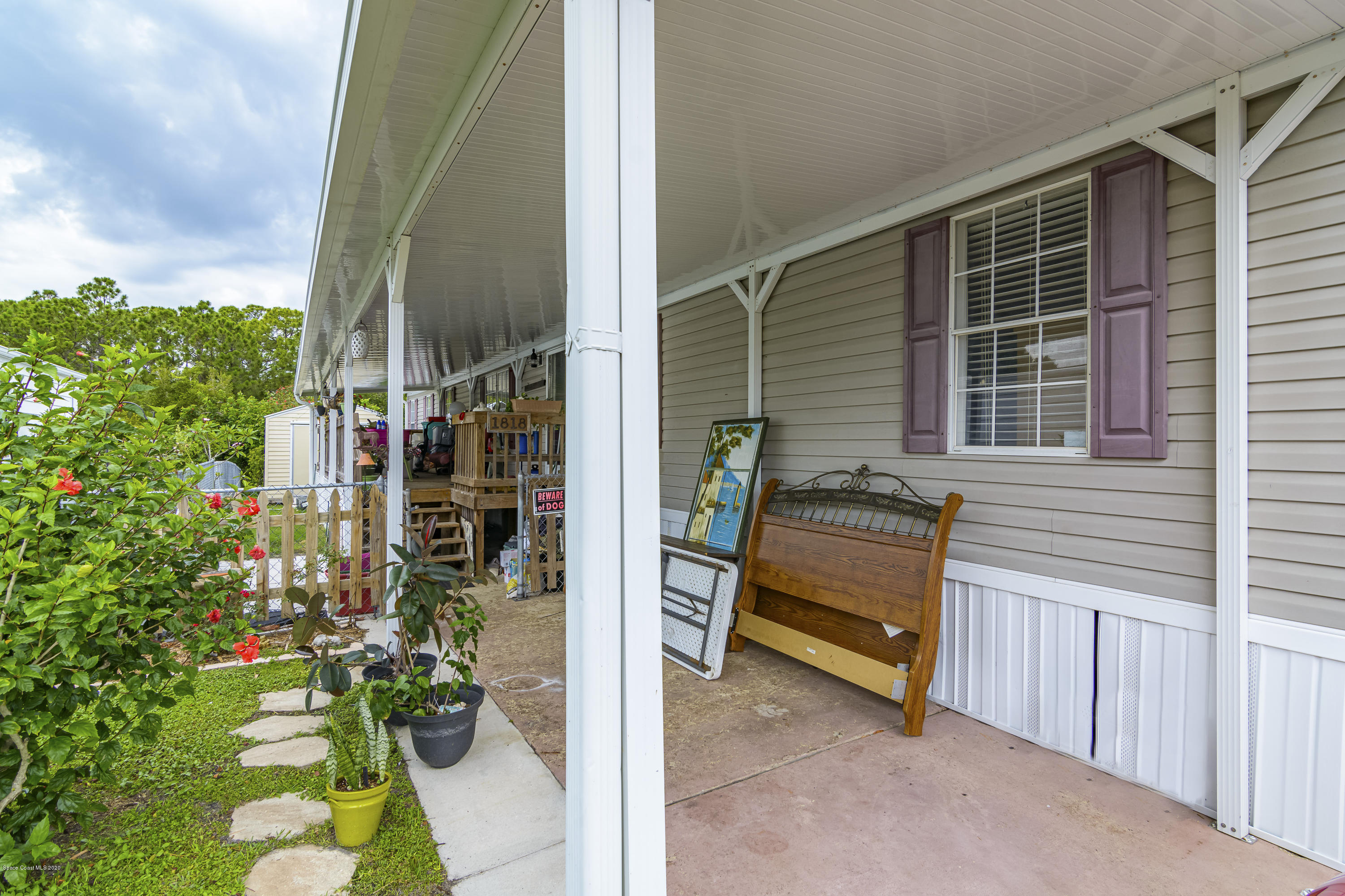 1818 Mango Street Northeast Palm Bay, FL 32905 - Photo 10 of 18 Large Covered Front Porch
