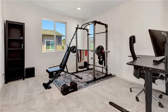 a view of kitchen with cabinets and wooden floor