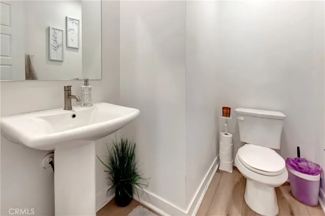 a bathroom with a sink a mirror and shower