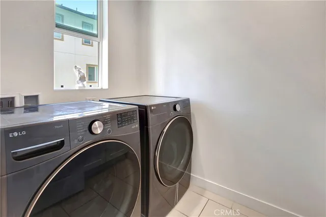 a bathroom with a sink toilet and a mirror