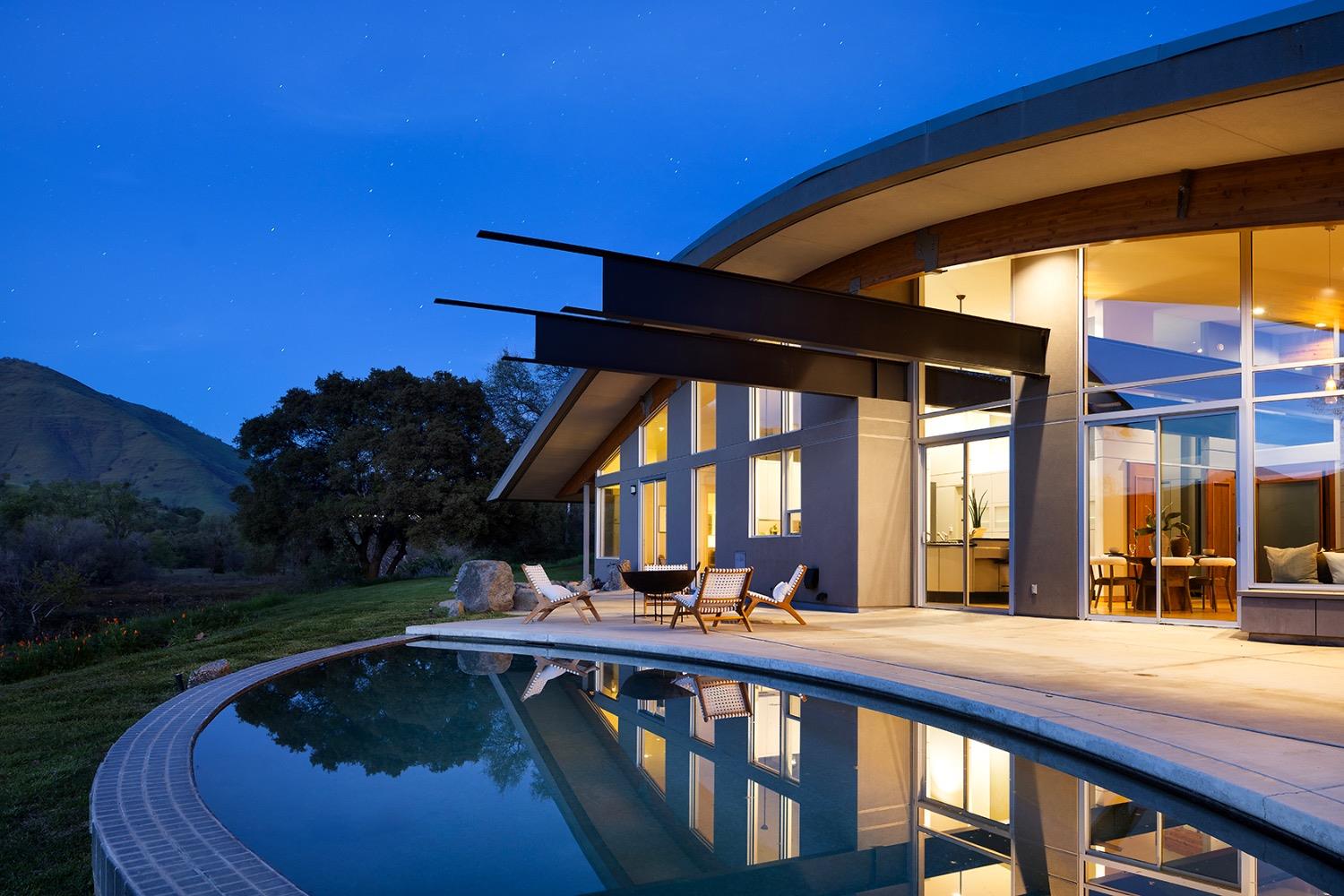 a view of a swimming pool with a patio
