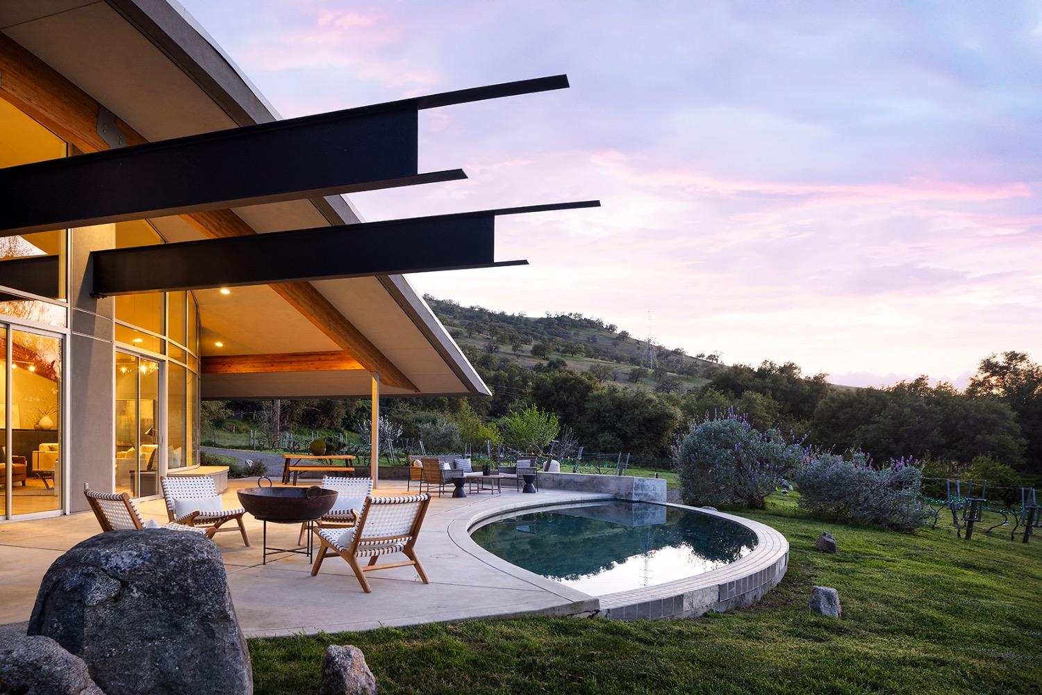 26210 Elwood Road Sanger, CA 93657 - Photo 22 of 36 a swimming pool with outdoor seating and yard