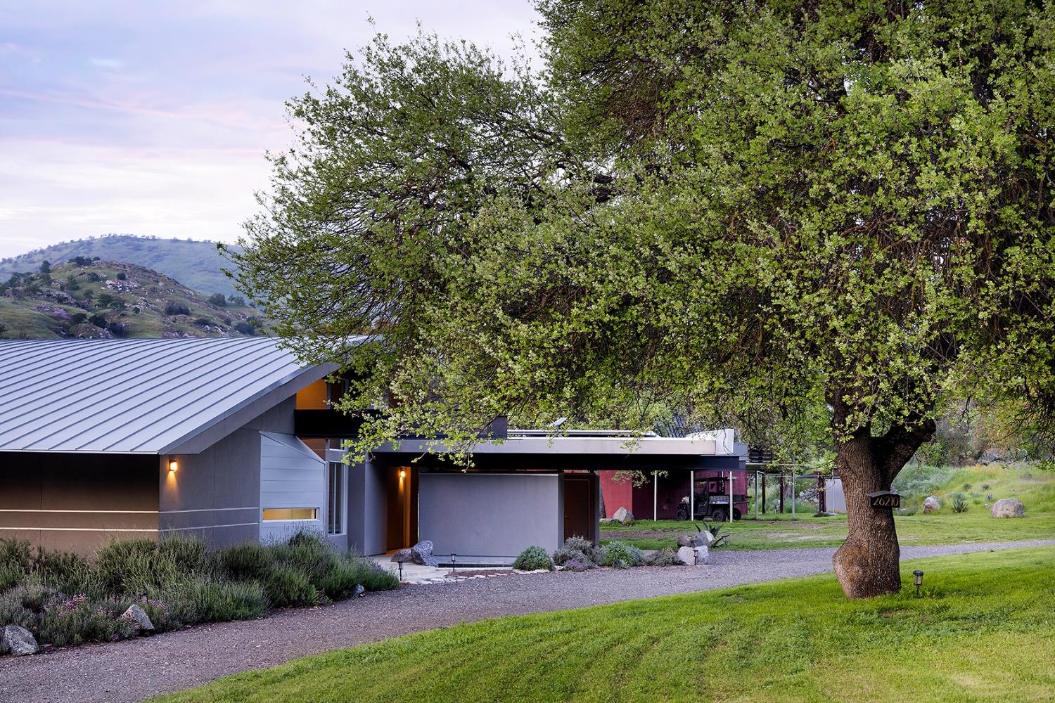 26210 Elwood Road Sanger, CA 93657 - Photo 27 of 36 a front view of a house with garden