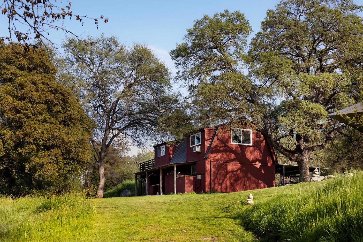 26210 Elwood Road Sanger, CA 93657 - Photo 29 of 36 a view of a building with a yard