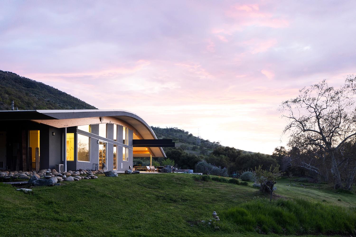 26210 Elwood Road Sanger, CA 93657 - Photo 3 of 36 a front view of a house with a garden