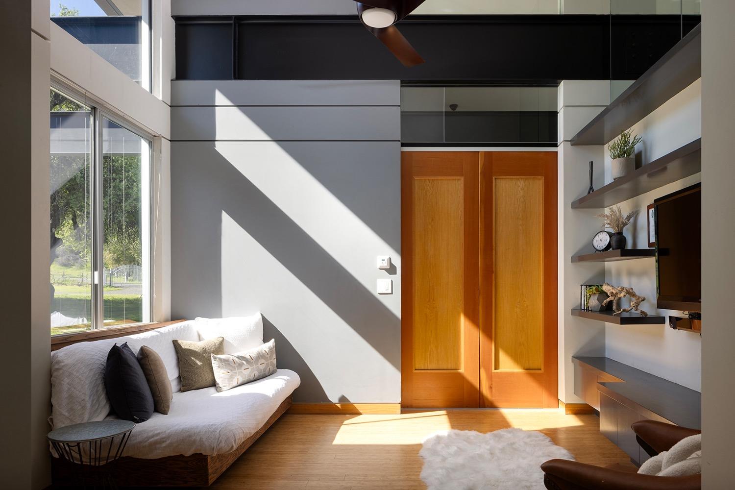 26210 Elwood Road Sanger, CA 93657 - Photo 6 of 36 a living room with furniture and a floor to ceiling window