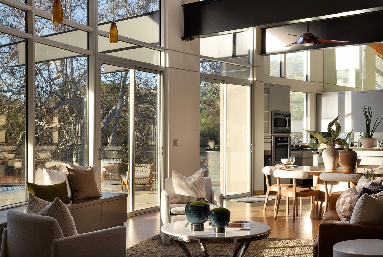 26210 Elwood Road Sanger, CA 93657 - Photo 10 of 36 a living room with furniture and floor to ceiling windows