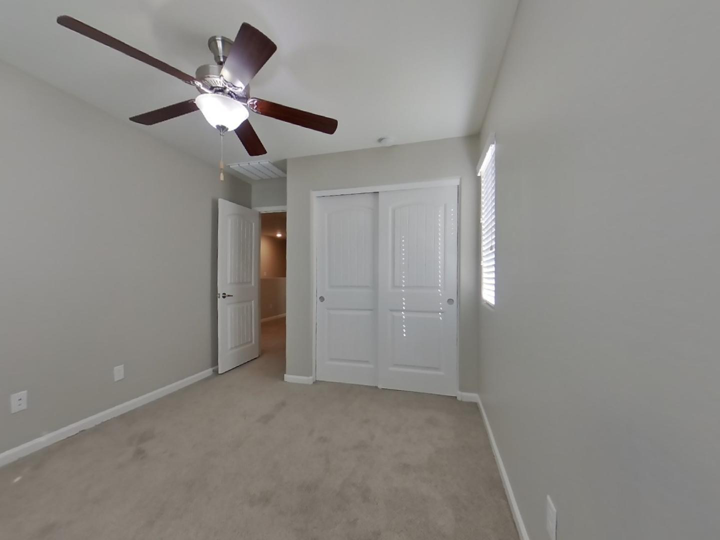 12565 West Via Dona Road Peoria, AZ 85383 - Photo 10 of 17 en empty room with fan